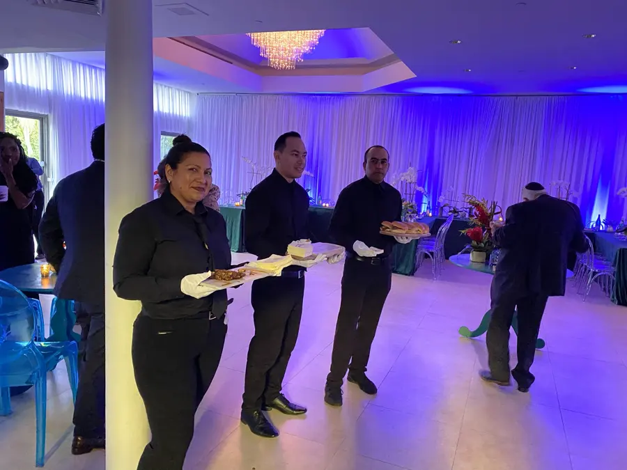 Servers ready to pass hors d'oeuvres