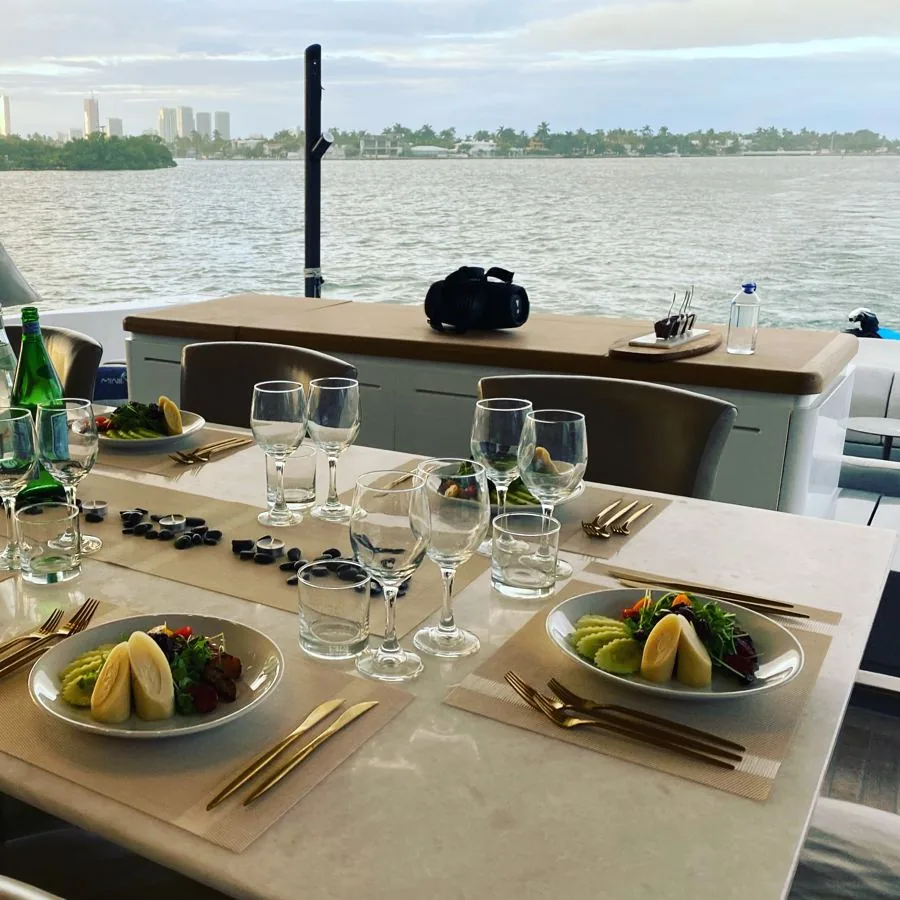 Table set for a private kosher dinner aboard a yacht in Miami