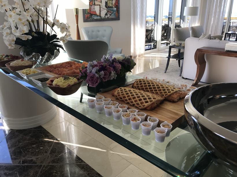 Brunch buffet with smoked salmon, salads and lattice puff pastry salmon