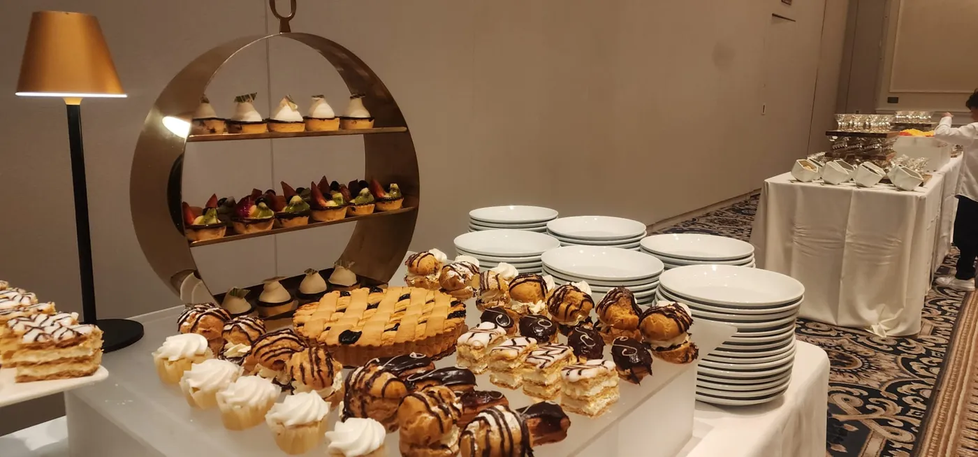 Viennese dessert table on a gold circular stand