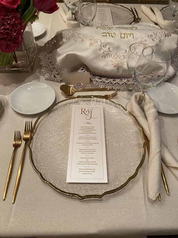 Shabbat and Yom Tov table setting with embroidered challah cover