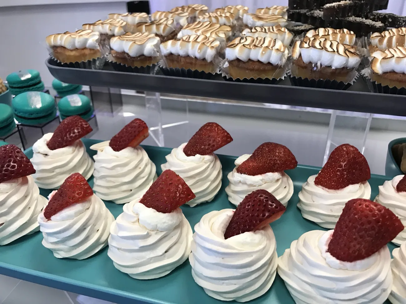 Mini strawberry pavlovas and meringue cupcakes